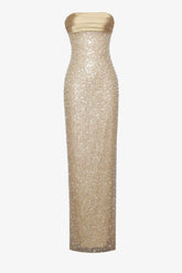 Gold strapless evening gown with sequin detailing on a white background